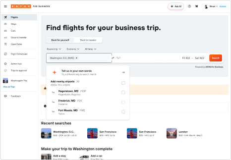 KAYAK for Business flight search page with the origin field open, showing an Ask AI prompt and a nearby-airports picker